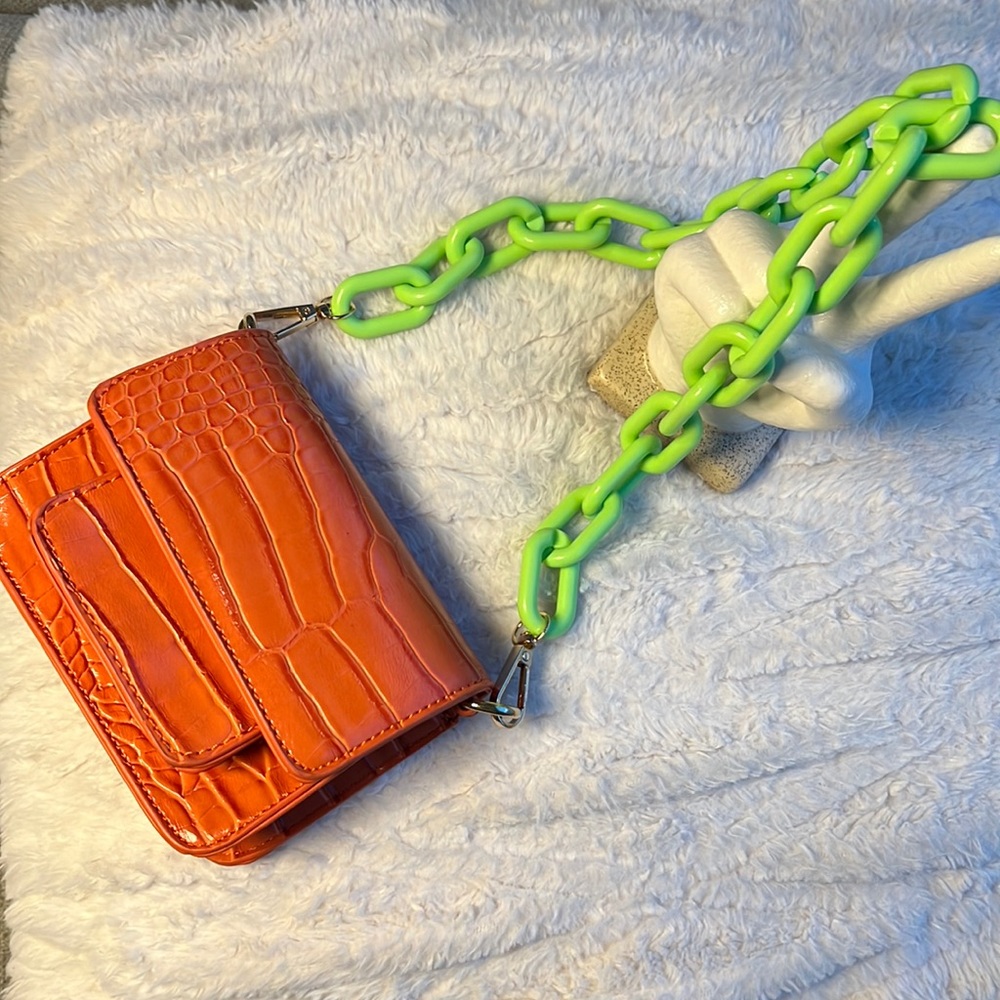 Orange croc print faux leather purse with green chain